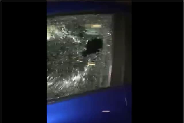 Photos show the damage to Rebecca Huggins' car.
