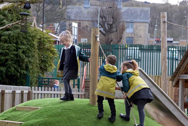 Reception children pictured in the EYFS Outdoor Area. NDFP-09-03-21-DenabyMain 5-NMSY