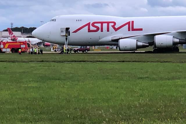 Crews have been evacuated from the aircraft by ladders. (Photo: James Leyland).