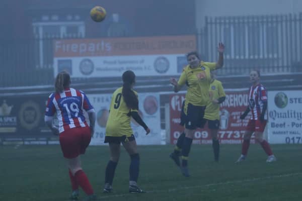 Lauren Camm heads clear for Mexborough Athletic. Picture: Julian Barker