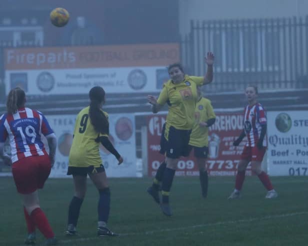 Lauren Camm heads clear for Mexborough Athletic. Picture: Julian Barker