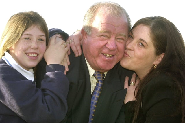 Sheffield Masons member Tom Bulmer gets a kiss of thanks from Kim Griffiths in thanks for the Masons £5,000 donation to her daughters Jamie Leigh(left) Trust Fund at Westfield School