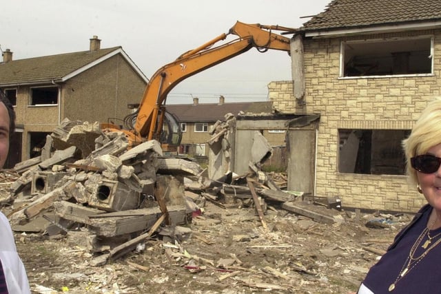 In 2000 Julian Hurley, and Linda Pearce, Chair of the local Tenant And Residents Associtaion, are pictured on the Willow Estate, where demolition work had just started.