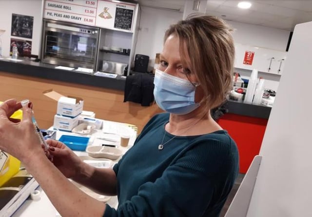 A vaccine being prepared at the Keepmoat Stadium