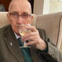 Cheers! Stan Vickers raises a glass