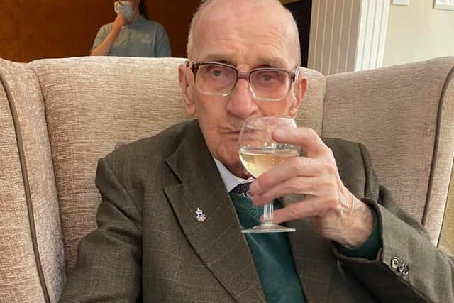 Cheers! Stan Vickers raises a glass