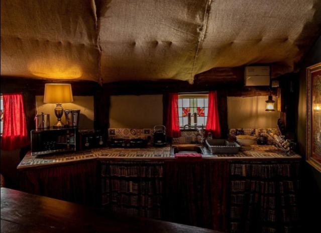 The area is created to mirror the common room from the Gryffindor House in the Harry Potter films.