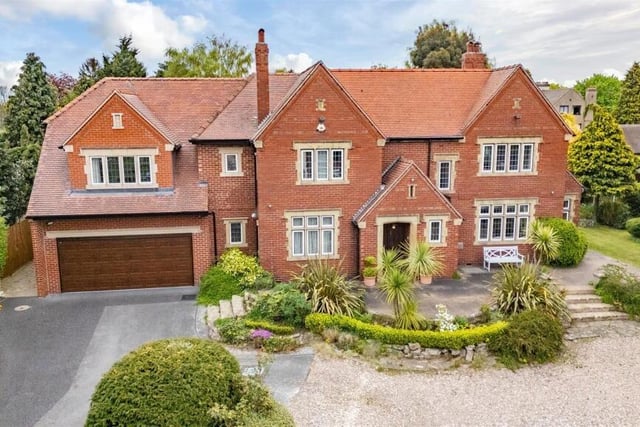 The front aspect of the Arts and Crafts design home.