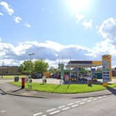 Staff say they were subjetced to racist abuse by knife-carrying yobs who threw fuel pumps around during a break in attempt at the Jet petrol station in Dunscroft.
