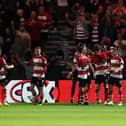 Joe Ironside of Doncaster Rovers celebrates with his teammates after scoring the team's first goal  during the Carabao Cup Second Round match between Doncaster Rovers and Everton at Keepmoat Stadium on August 30, 2023 in Doncaster, England. (Photo by George Wood/Getty Images)