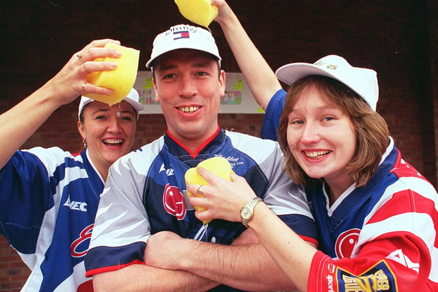 Sheffield Eagles' Mark Aston was given a soaking  by Midland Bank girls, l to r: Wendy Ramsay, (left) and  Rachael Ball, at Morrisons at Halfway in 1998