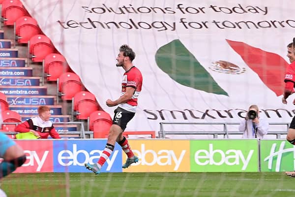 Doncaster's Tom Nixon celebrates his goal.