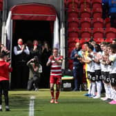 James Coppinger walks out to a guard of honour. Photo: George Wood/Getty Images