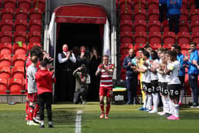 James Coppinger walks out to a guard of honour. Photo: George Wood/Getty Images