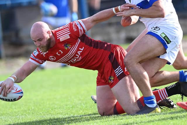 Liam Johnson scores for Doncaster in the play-off final against Workington Town. Photo: Howard Roe/AHPIX Ltd