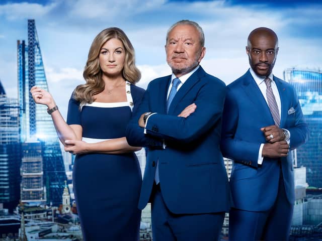 Sir Alan Sugar flanked by fellow Apprentice judges Baroness Brady and Tim Campbell