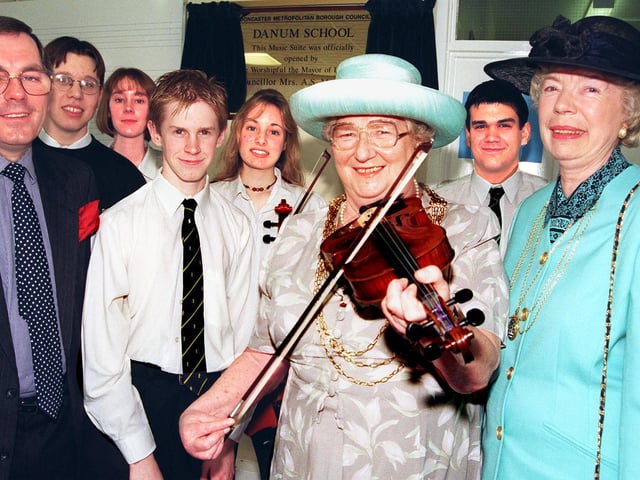 The Mayor of Doncaster, Councillor Sheila Mitchinson, officially opened Danum School's music suite in 1998. Our picture shows the Mayor trying to coax a note out of a violin, watched by the Mayoress, Mrs Audrey Gregory (right), head of performing arts Tony Harris, and pupils Rob Yorke, Michelle Phillips, both aged 17, Steven Hirst, aged 16, Helen Cusworth and Ben Catt, both aged 17.