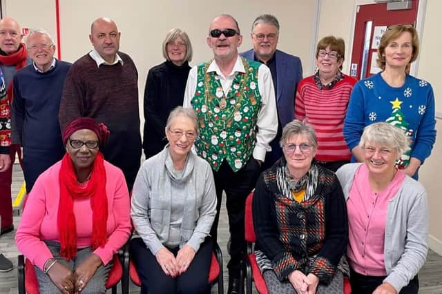 Volunteers from the Talking Newspaper assemble to bring listeners the 2022 Christmas edition ably assisted by the Civic Mayor Cllr I an pears on - wearing the festive waistcoat. 