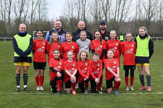 Junior Belles with first team players Phoebe Sneddon (left) and Katie Yates (right).