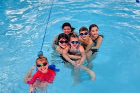 The group of swimmers raised money for two different charities.
