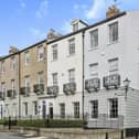 The impressive outer view of the Georgian town house that's currently for sale.