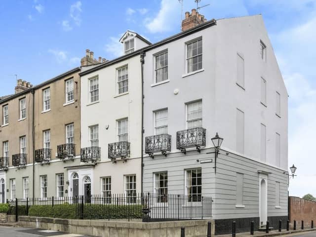 The impressive outer view of the Georgian town house that's currently for sale.