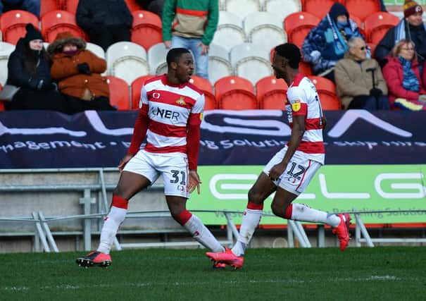 Niall Ennis, celebrates with Madger Gomes