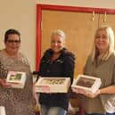 Pictured at the event are Friends chairperson Bev Chapman, Nicola Lilly (cake maker) and Danielle Betts (secretary).