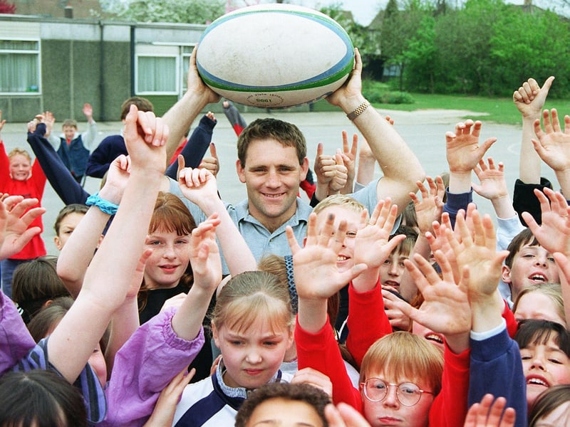 Former Rugby Union international Richard Wareham with Armthorpe Tranmoor Primary School pupils in April 1997