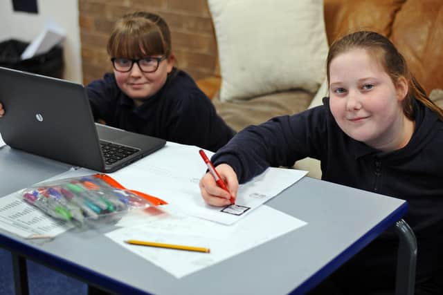 Year six pupils Lacie and Mia, pictured carrying out research based learning for their project work. Picture: NDFP-09-02-21-Plover 4-NMSY