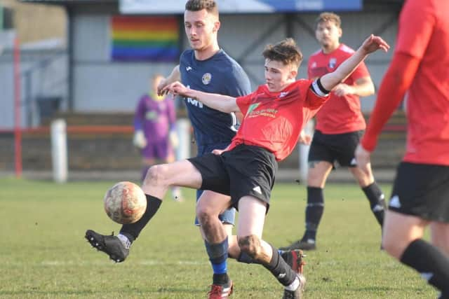 Bailey Conway (in red) in action for Rossington Main. Picture: Russ Sheppard/Offthebenchpics