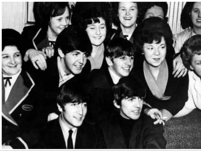 The Beatles surrounded by female admirers on one of their five visits to Doncaster.