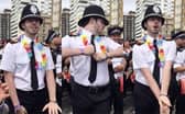 A policeman joins in the fun at Brighton Pride.