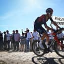 Ben Turner of Ineos Grenadiers pictured in action during the 119th edition of the 'Paris-Roubaix' cycling event earlier this year. Photo by JASPER JACOBS/BELGA MAG/AFP via Getty Images)