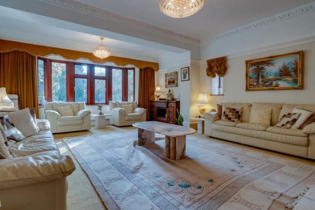 Natural light floods the lounge, through its many windows.
