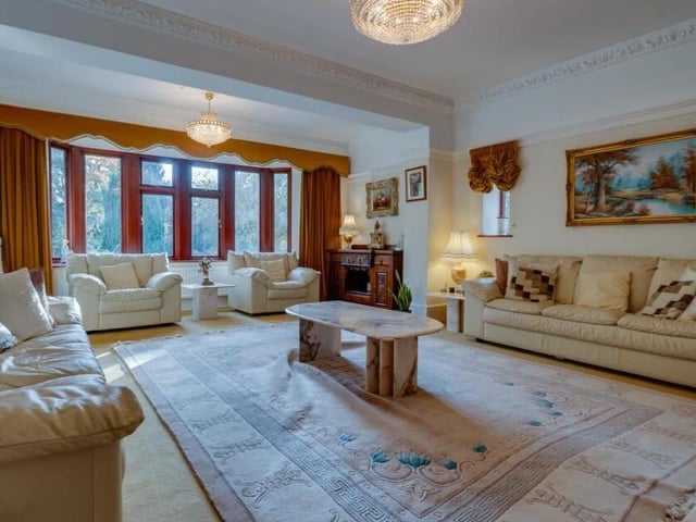 Natural light floods the lounge, through its many windows.