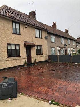 Roof tiles and debris outside a house on Welfare Road Woodlands after a freak storm this morning. Picture Ryan Jacques.
