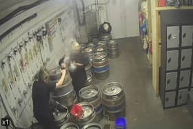 The pair were covered in beer after a keg at the pub released a "fountain of Carling." (Photo: Thornhurst Manor).