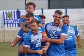 Armthorpe celebrate Jamie Austin’s match-winning goal.