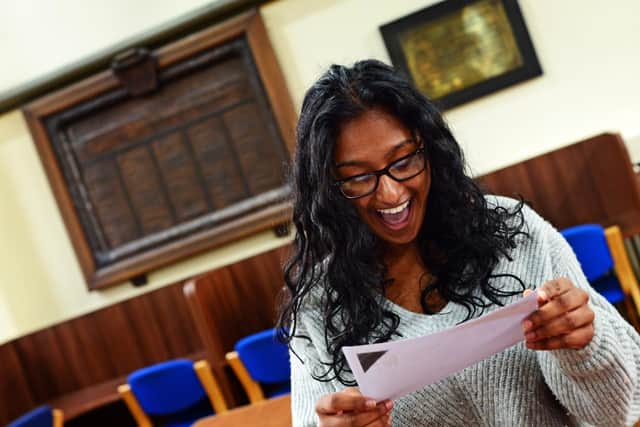 Hall Cross student Ojal Jackson, 18, of Wheatley, pictured celebrating after receiving 4 A * and is now heading to Leeds to study Medicine. Picture: Marie Caley NDFP-15-08-19-Alevel-HallCross-1