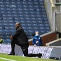 Darren Moore takes the knee
