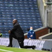 Darren Moore takes the knee