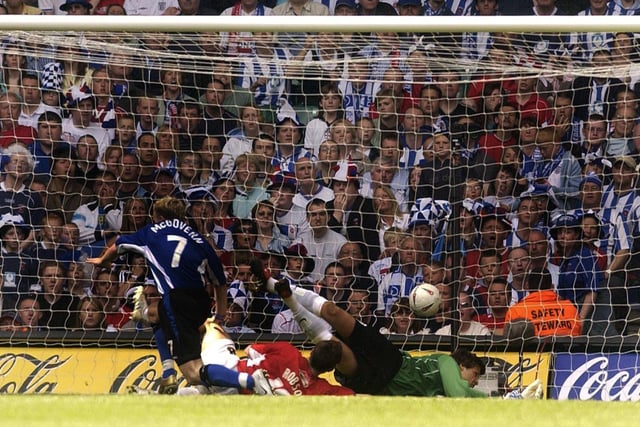 Jon-Paul McGovern scores the first goal against Hartlepool United during the League One play-off final at the Millennium Stadium in May 2005.