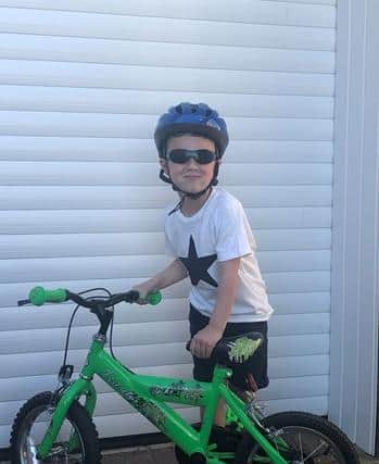 Noah Johnson, aged 5 with his bike.