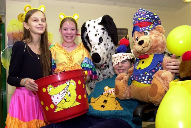 Staff and pupils at DRI's Hospital School will be dressed up for Children in Need  in 2003. Our picture shows, from left, Katy Harrison, aged 12, Stacey Shaw, aged 13, teacher Lindsey Mawson and Jonathan Garcia, aged 13.