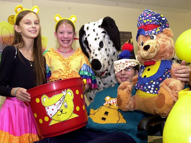 Staff and pupils at DRI's Hospital School will be dressed up for Children in Need in 2003. Our picture shows, from left, Katy Harrison, aged 12, Stacey Shaw, aged 13, teacher Lindsey Mawson and Jonathan Garcia, aged 13.