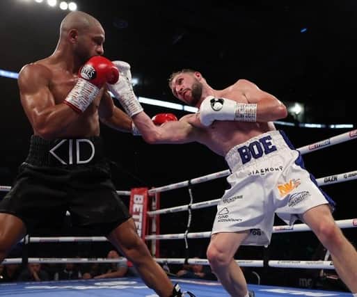 Maxi Hughes (right) pictured in victorious match against former world champion Kid Galahad. Photo by Mark Robinson.