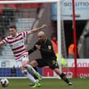 Caolan Lavery in action for Doncaster Rovers (credit: Mark Fletcher | MI News).