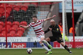 Caolan Lavery in action for Doncaster Rovers (credit: Mark Fletcher | MI News).