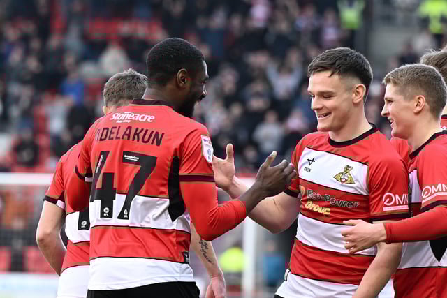 Hakeeb Adelakun celebrates his strike with Owen Bailey